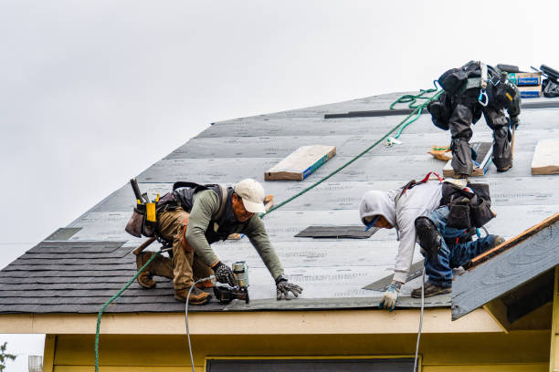Professional Gutter Installation technician working in North Easton, MA